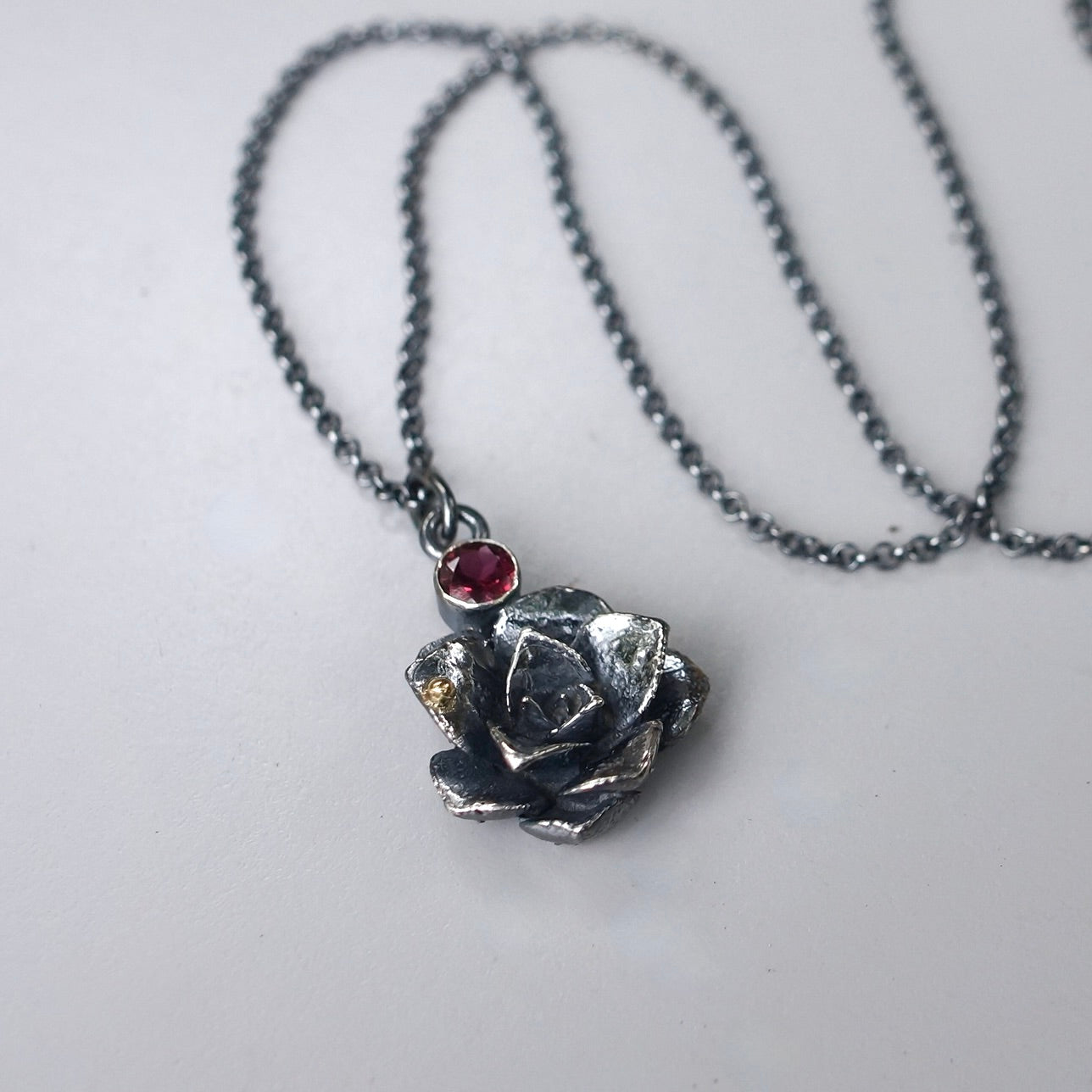 Rhodolite garnet and silver succulent pendant