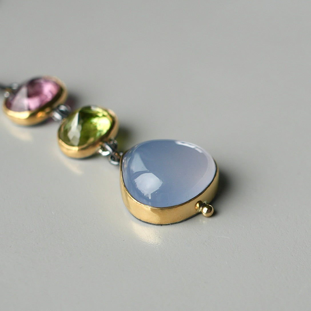Tourmaline, sphene and blue chalcedony pendant