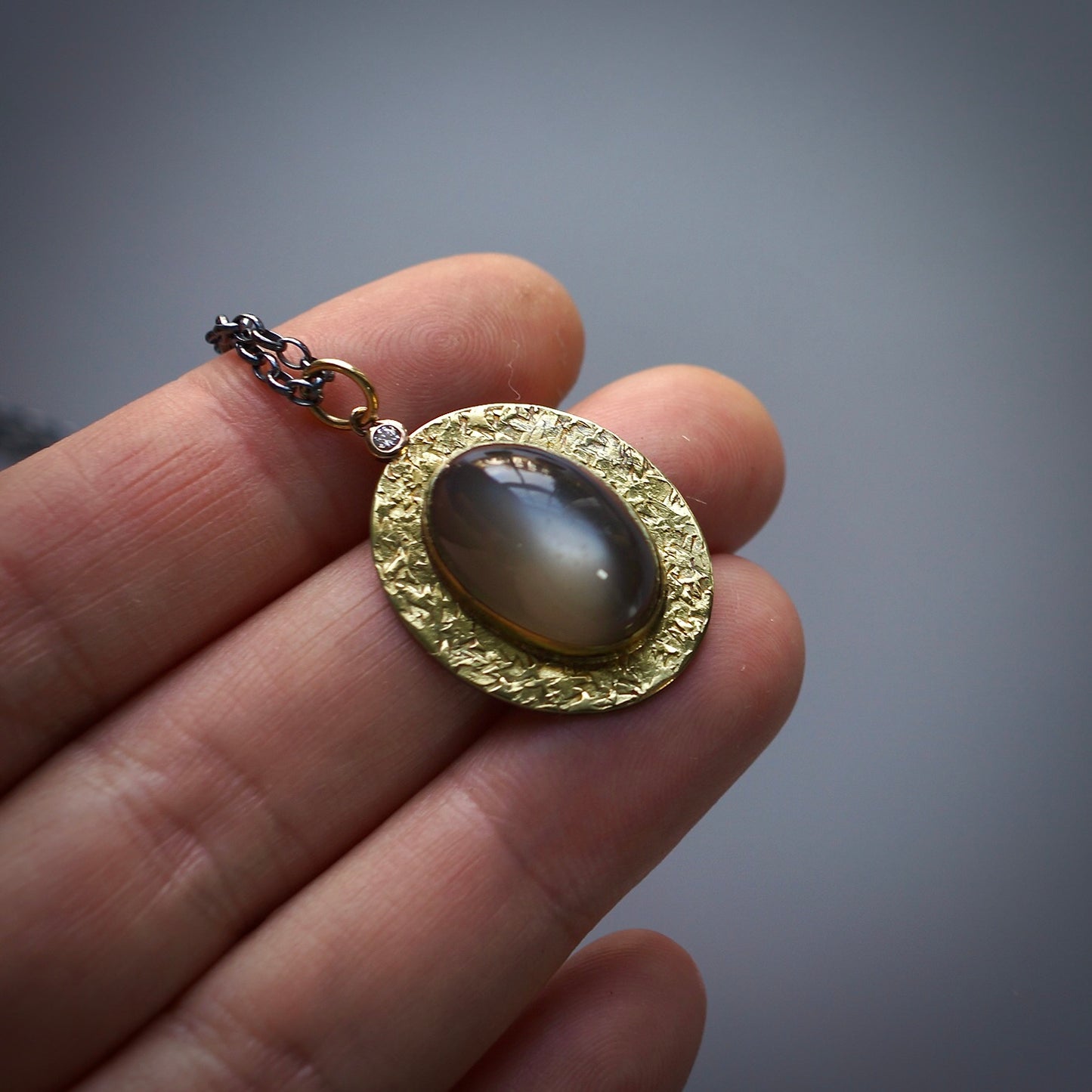 Green moonstone and diamond pendant