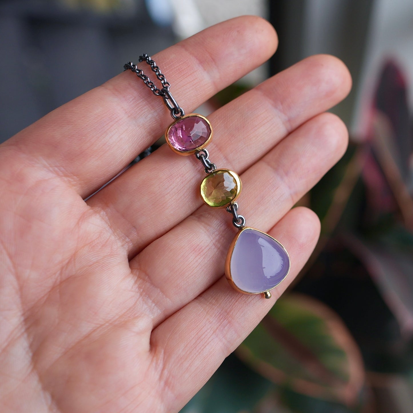 Tourmaline, sphene and blue chalcedony pendant