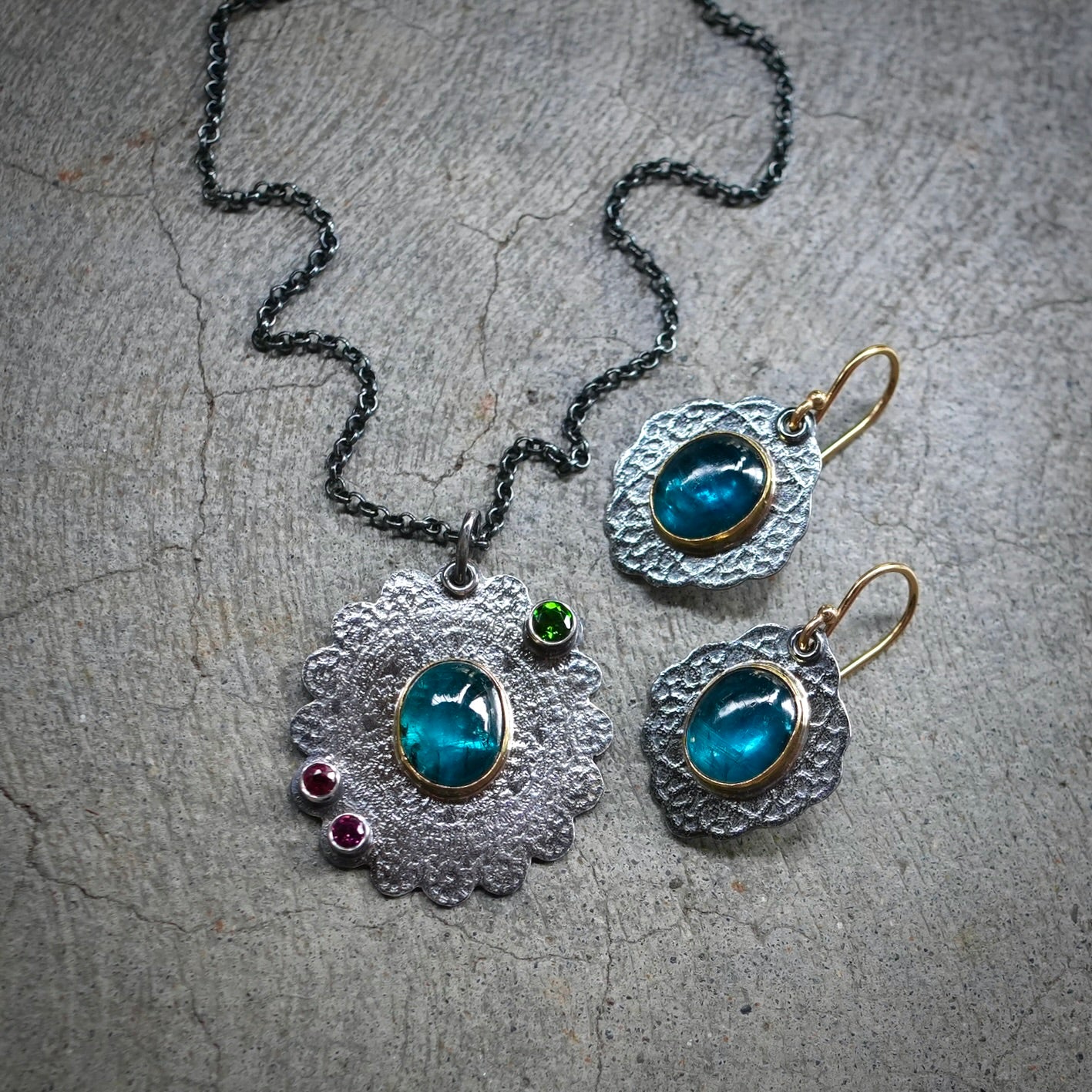Teal blue kyanite pendant with colorful accents