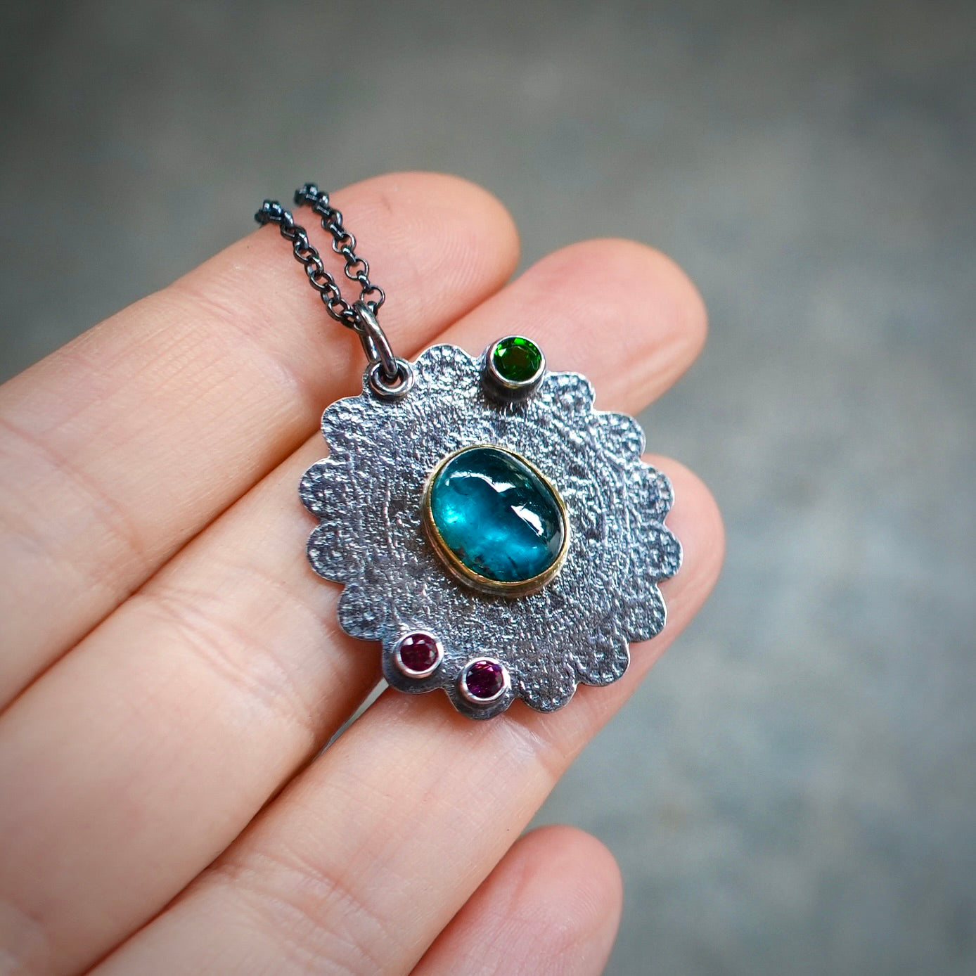 Teal blue kyanite pendant with colorful accents