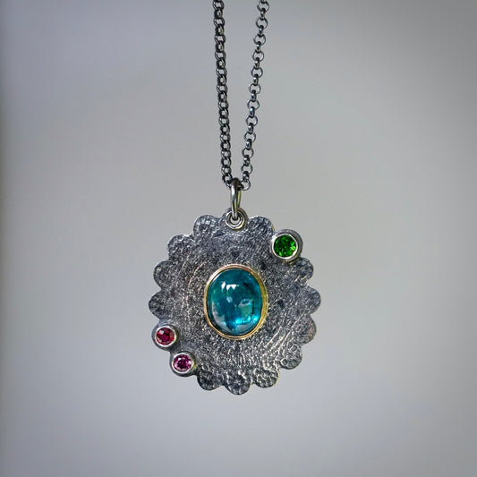 Teal blue kyanite pendant with colorful accents