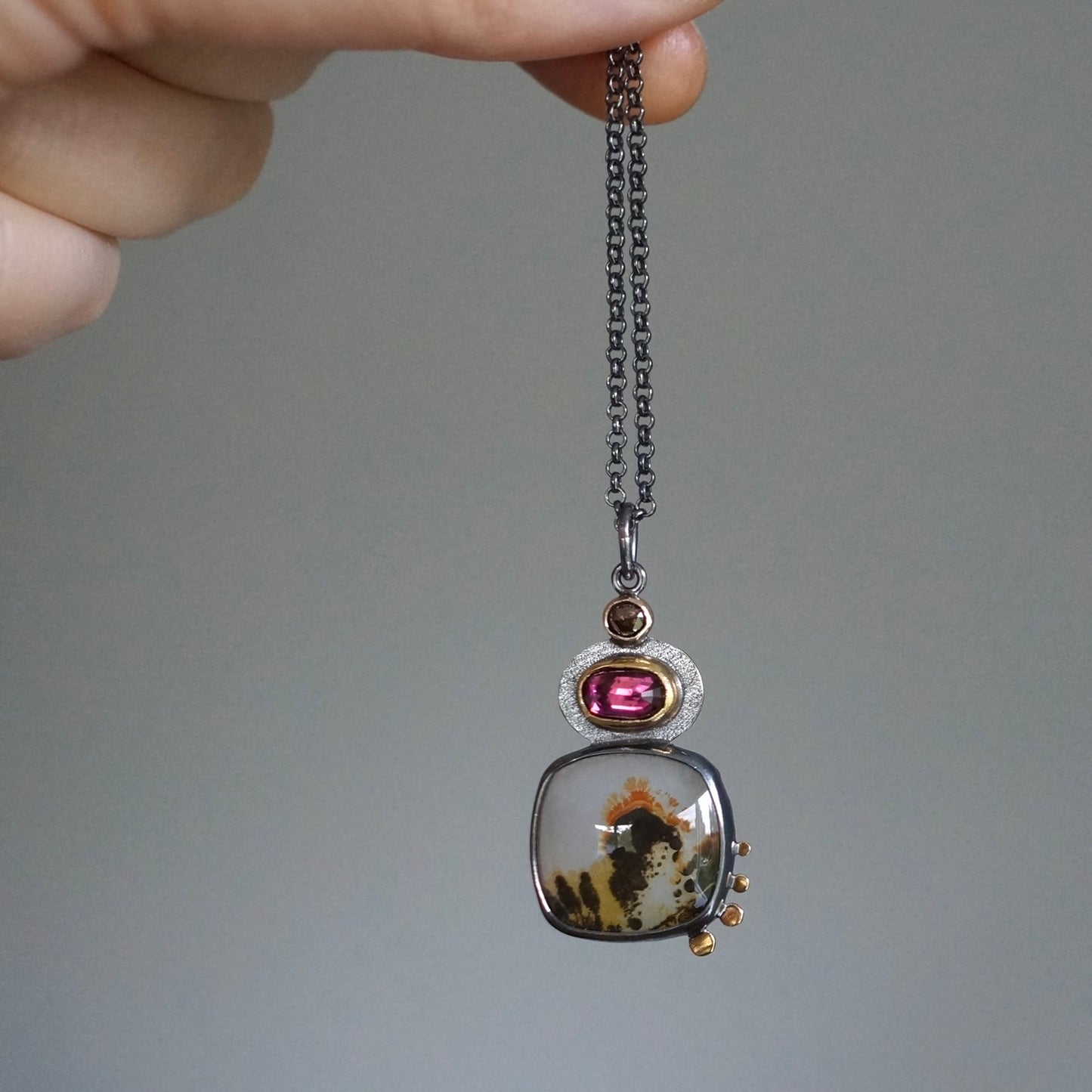 Dendritic agate, garnet and chocolate diamond pendant