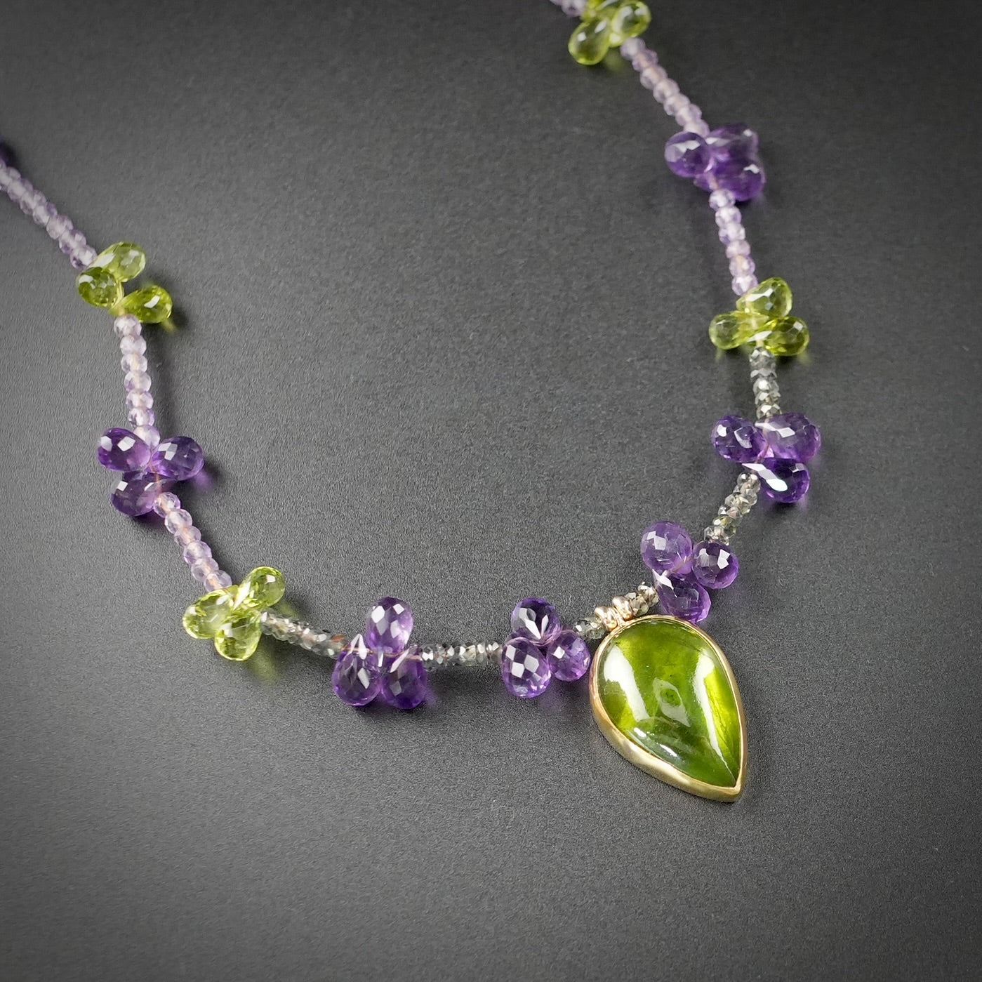 Vesuvianite necklace with amethyst, peridot and green sapphire