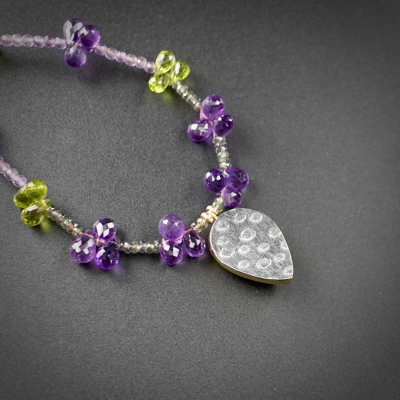 Vesuvianite necklace with amethyst, peridot and green sapphire