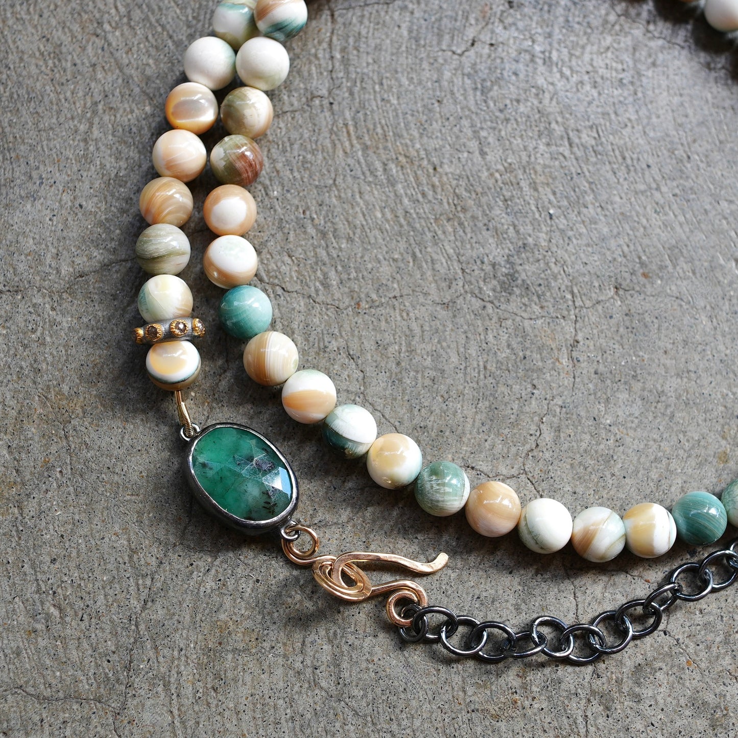 Beige and green mother of pearl necklace with accent diamond bead and rose cut emerald set in bezel