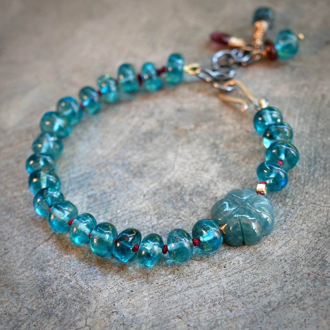 London blue topaz, jade and garnet silk-knotted bracelet