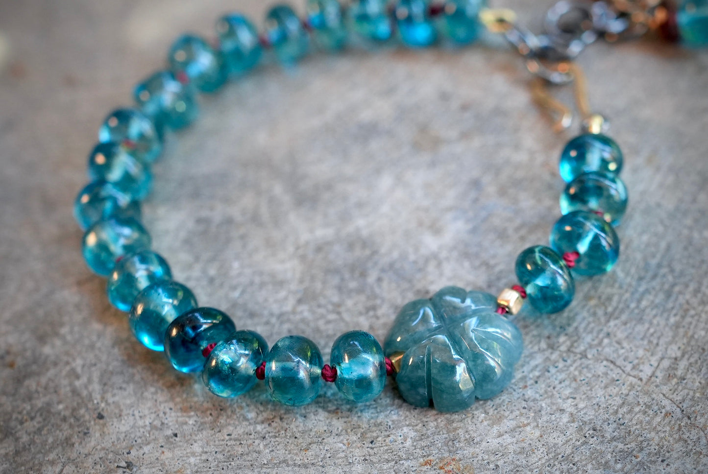 London blue topaz, jade and garnet silk-knotted bracelet