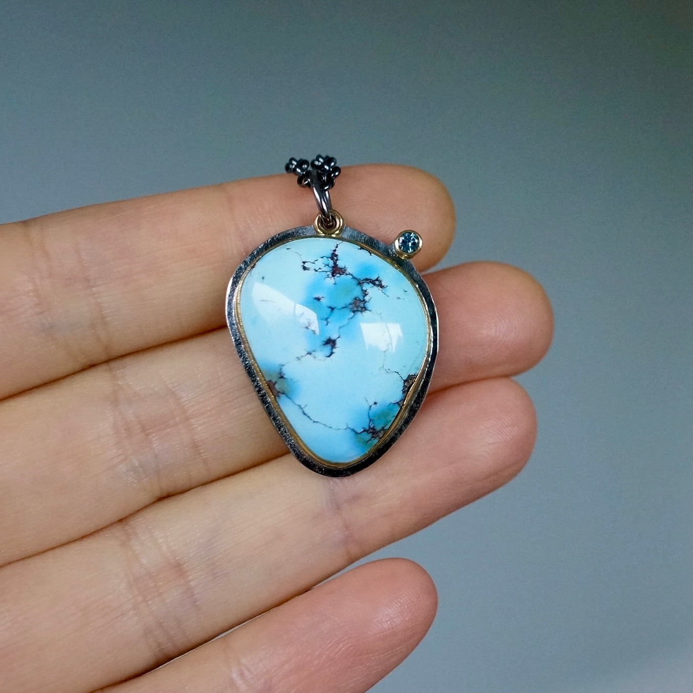 Golden Hills turquoise and Montana sapphire pendant