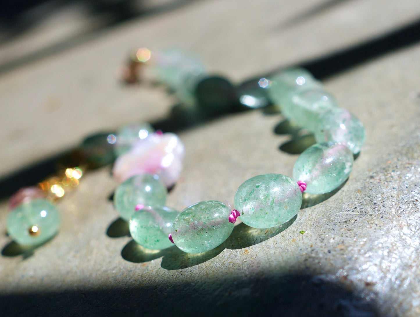 Green strawberry quartz and freshwater pearl silk-knotted bracelet