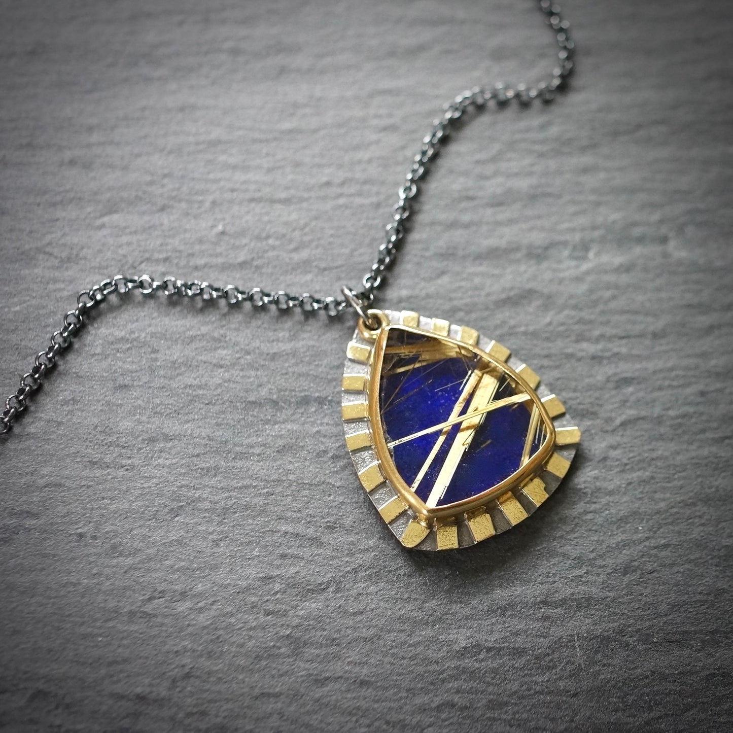 Rutilated quartz and lapis doublet pendant