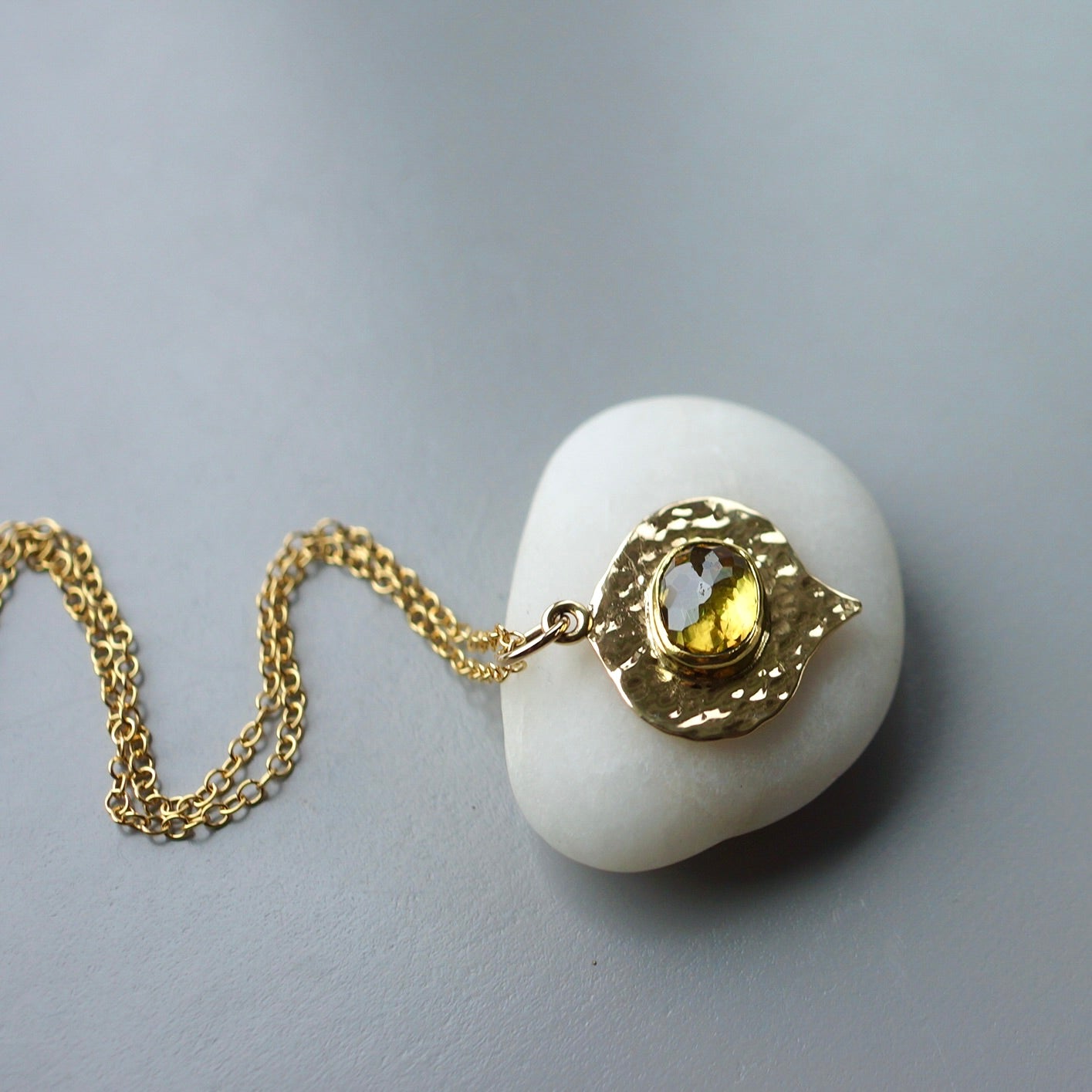 Solid gold green sphene pendant