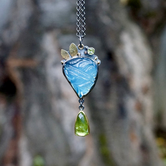 Carved aquamarine and green tourmaline pendant