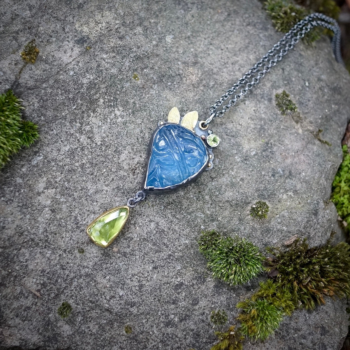 Carved aquamarine and green tourmaline pendant