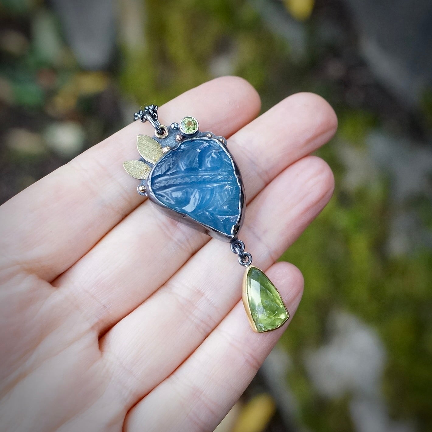 Carved aquamarine and green tourmaline pendant