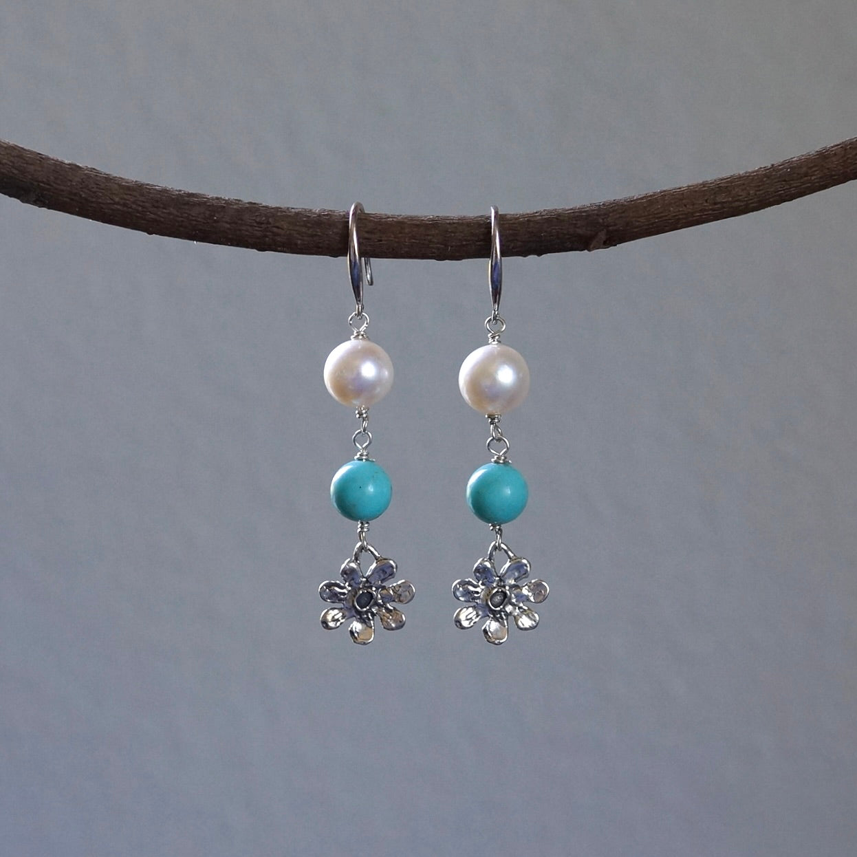 Turquoise and pearl earrings with silver flowers