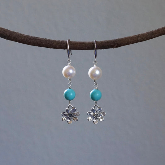 Turquoise and pearl earrings with silver flowers