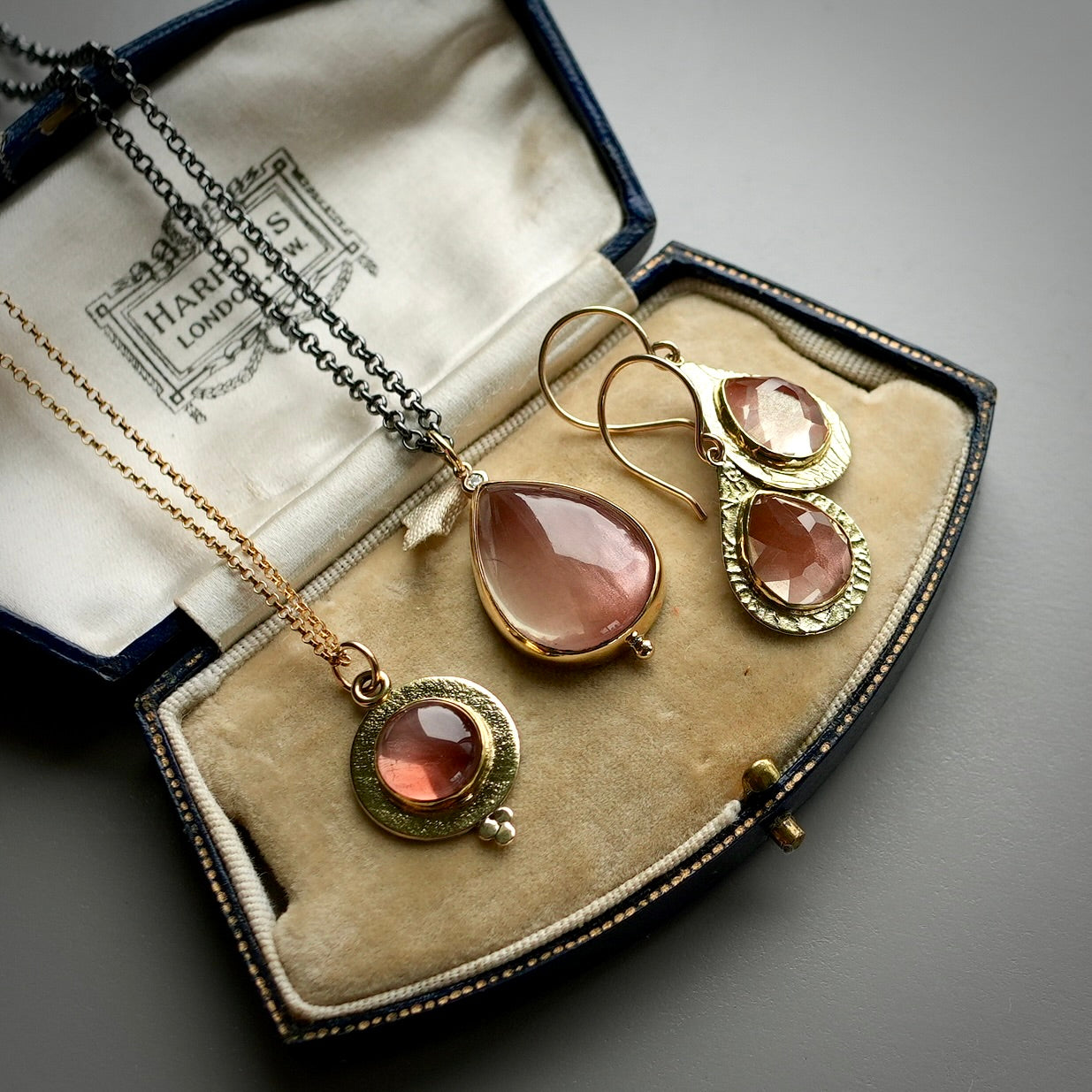 Oregon sunstone and diamond pendant