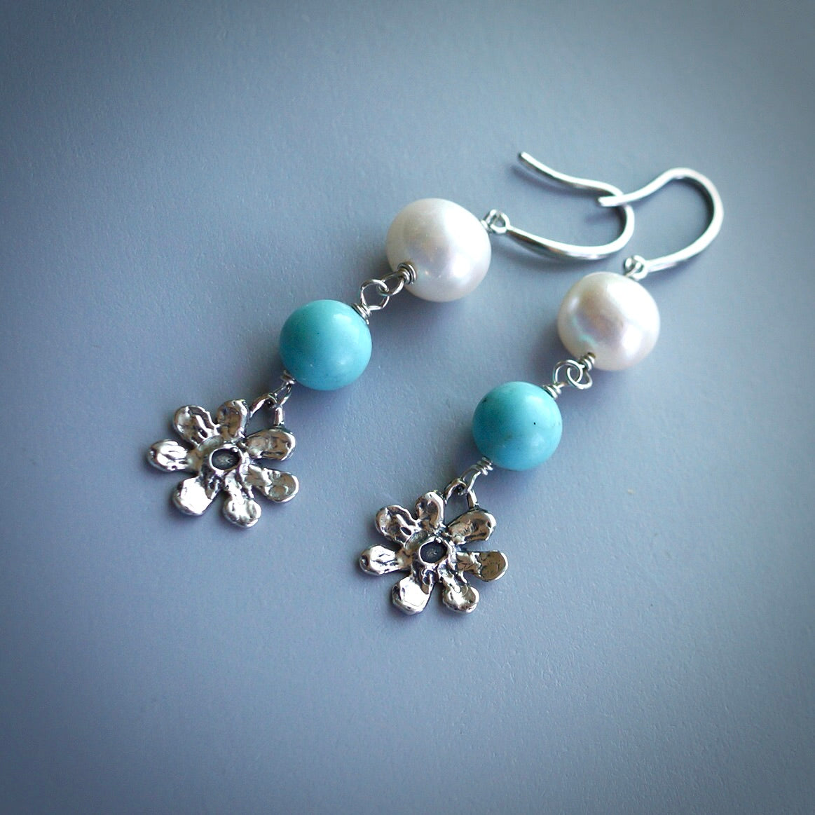 Turquoise and pearl earrings with silver flowers