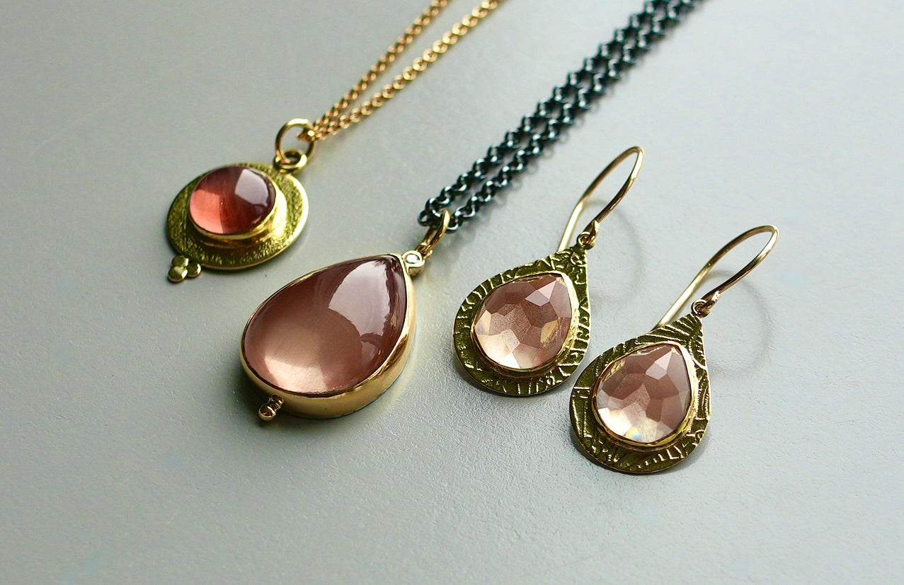 Oregon sunstone and diamond pendant