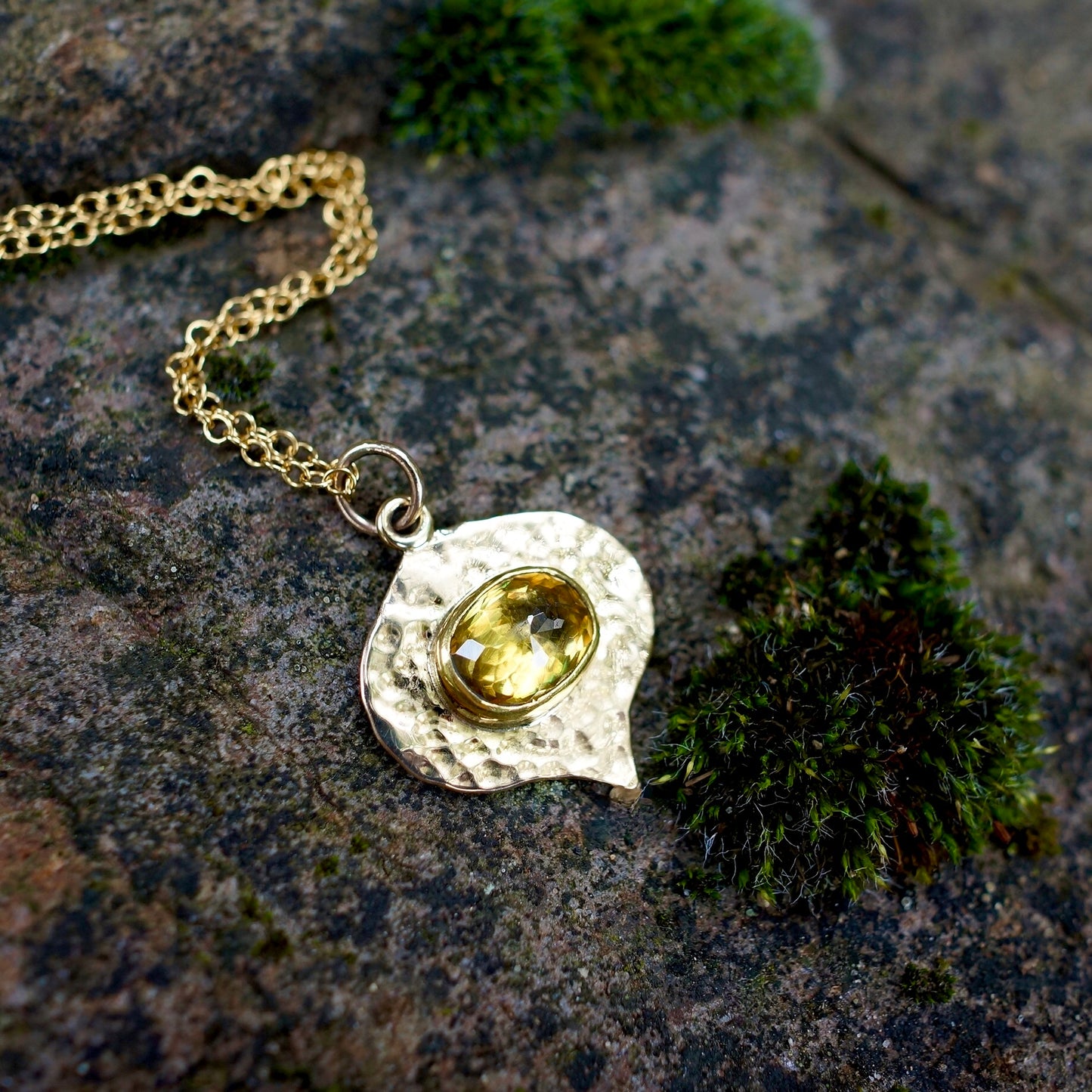 Solid gold green sphene pendant