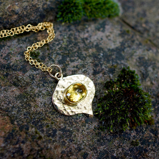 Solid gold green sphene pendant