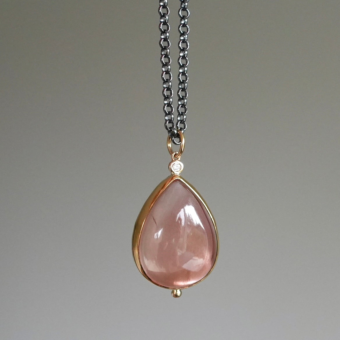 Oregon sunstone and diamond pendant