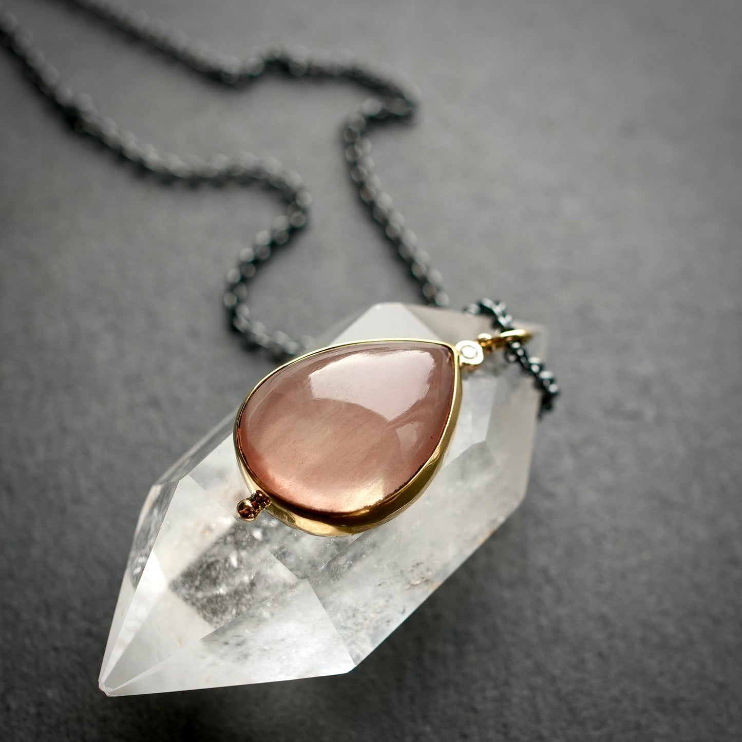 Oregon sunstone and diamond pendant