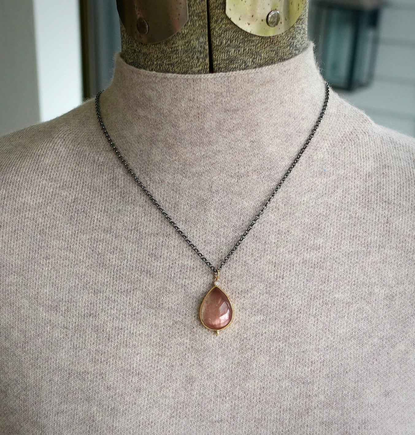 Oregon sunstone and diamond pendant