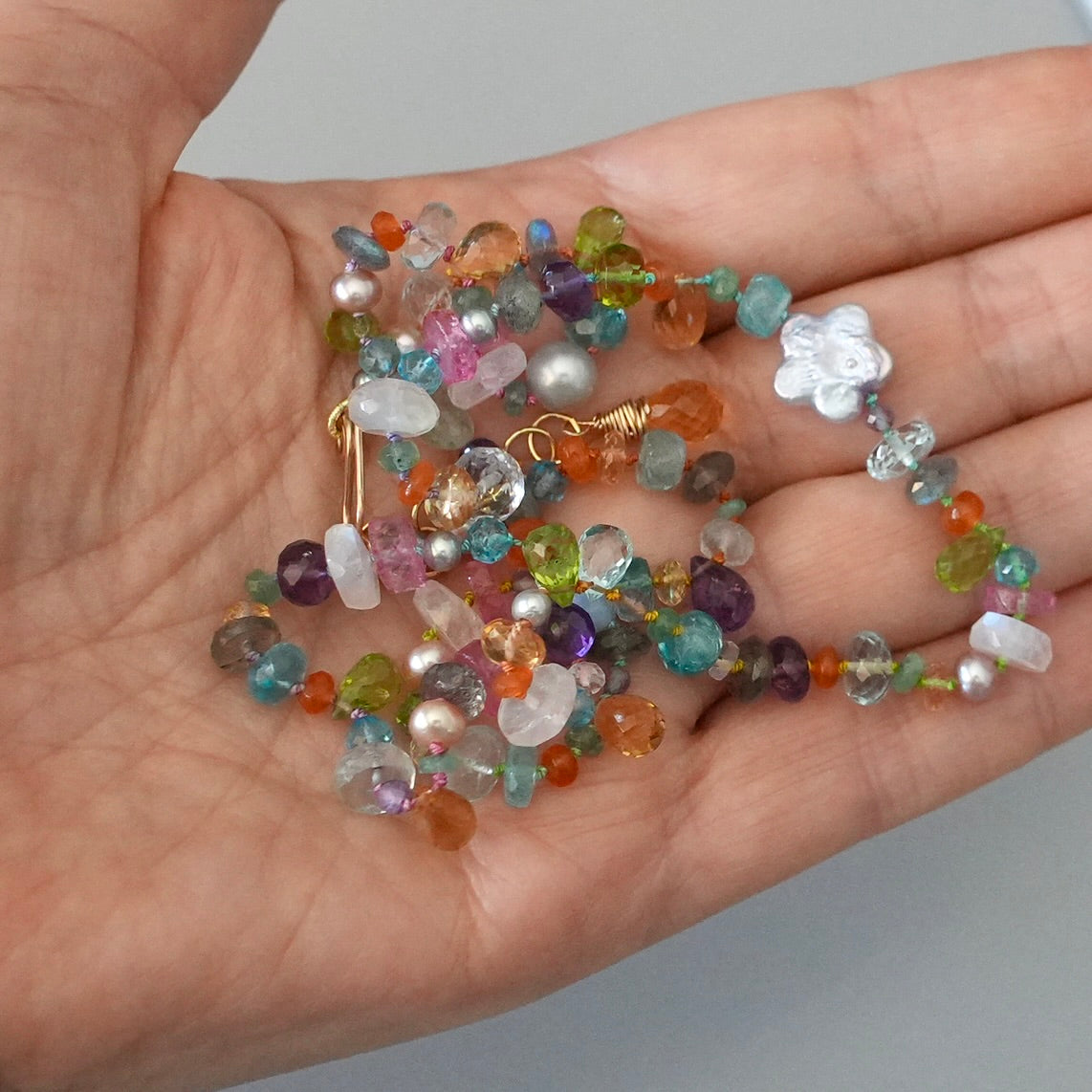 Vibrant gemstone mix silk-knotted necklace with a pearl flower