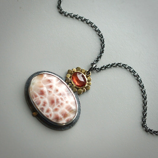 Thomsonite and sapphire pendant