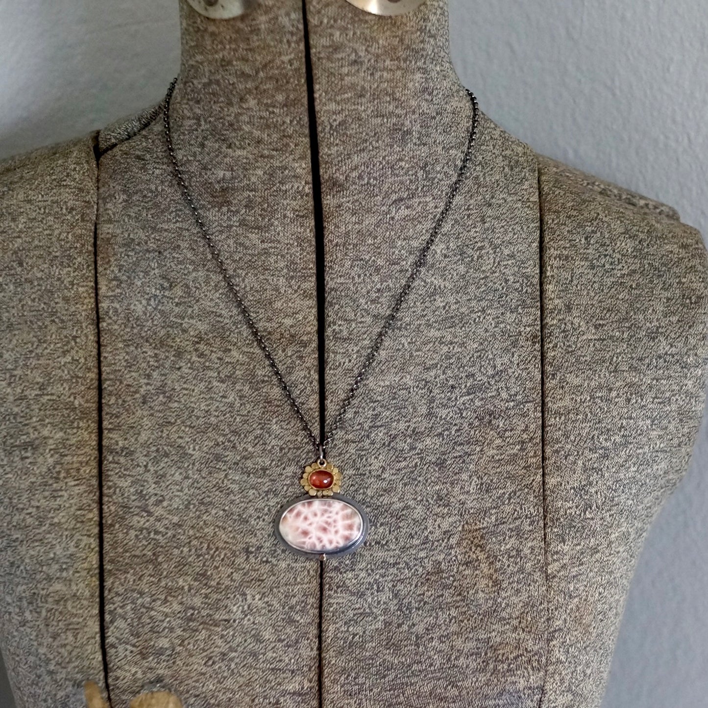 Thomsonite and sapphire pendant