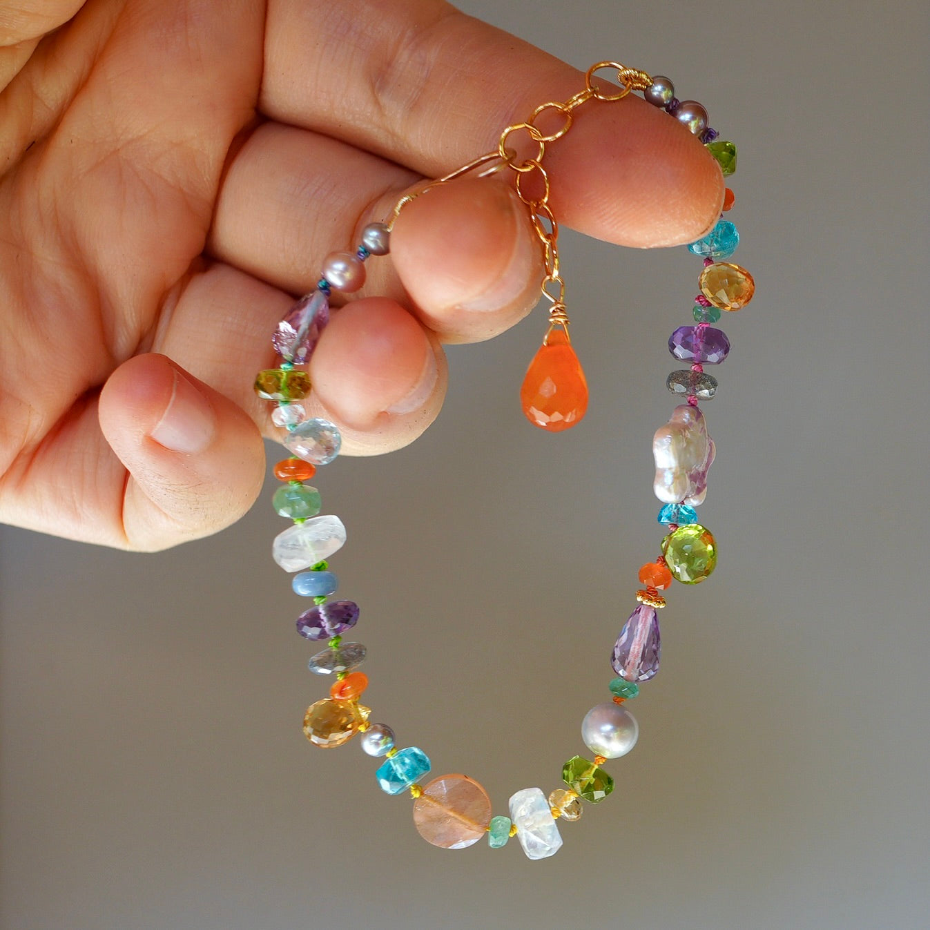 Vibrant gemstone mix silk-knotted bracelet with pearl flower
