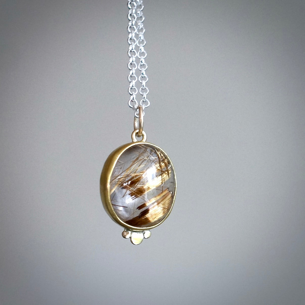 Rutilated quartz pendant
