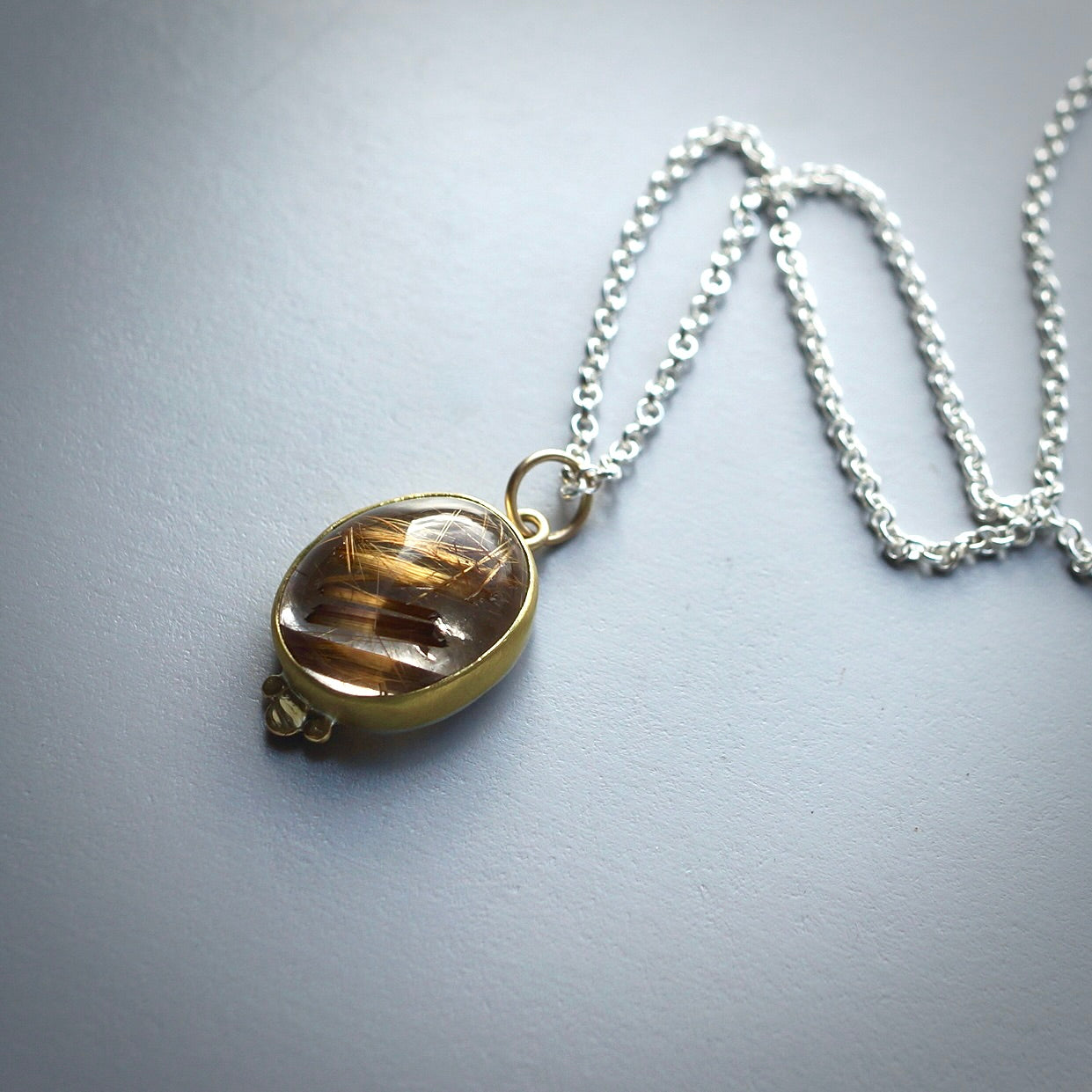 Rutilated quartz pendant