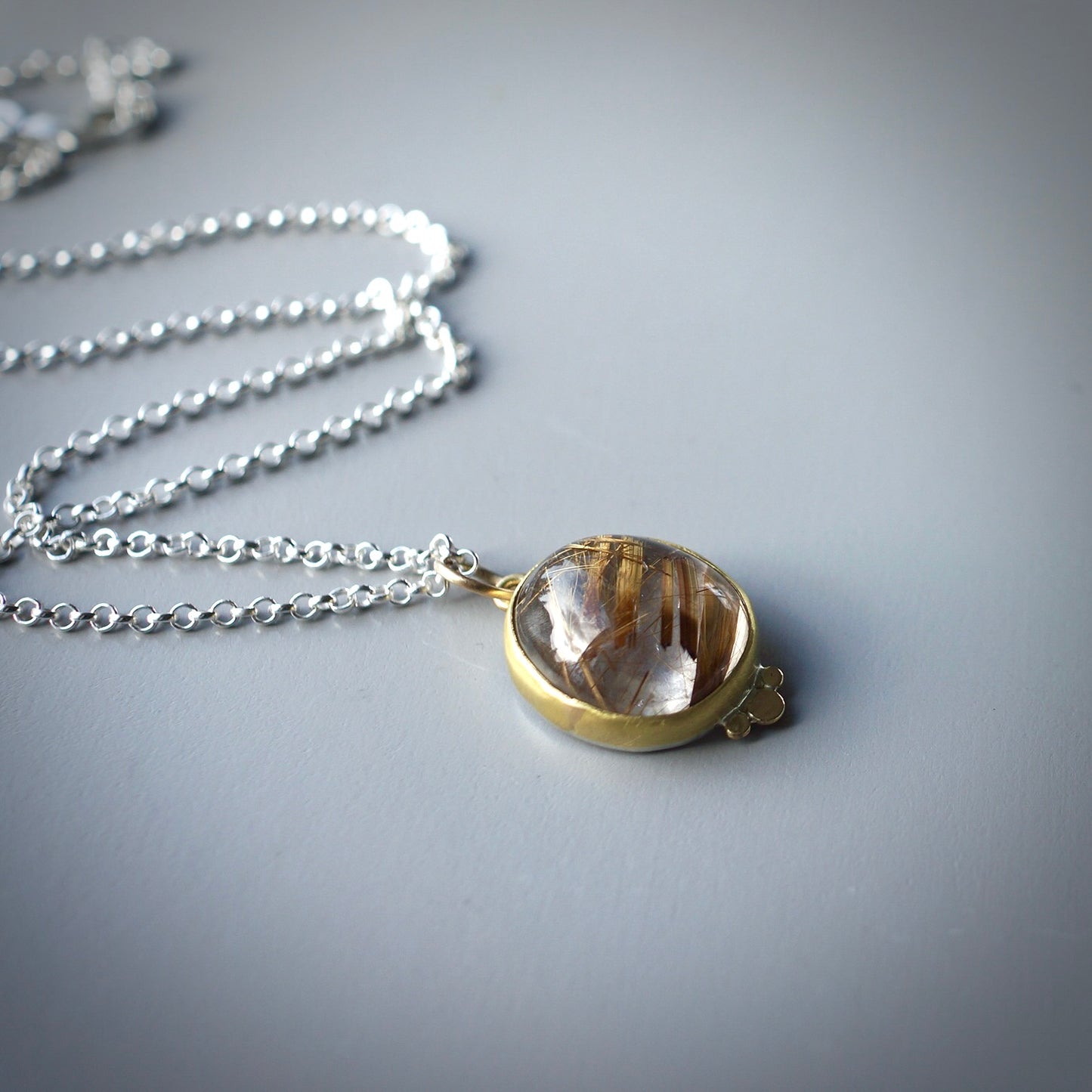 Rutilated quartz pendant