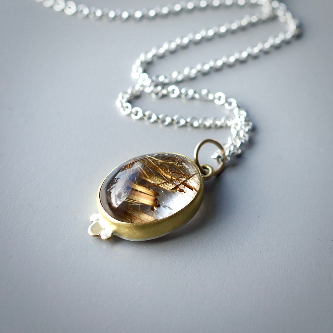 Rutilated quartz pendant