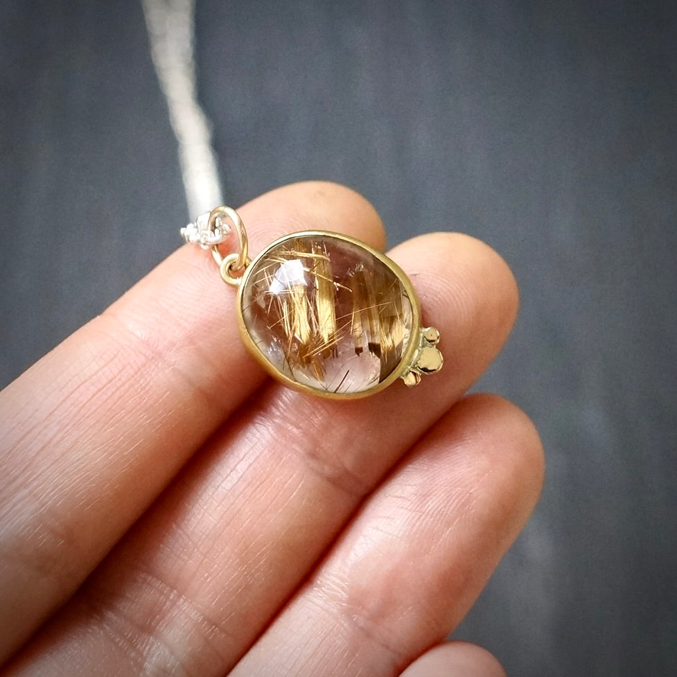 Rutilated quartz pendant
