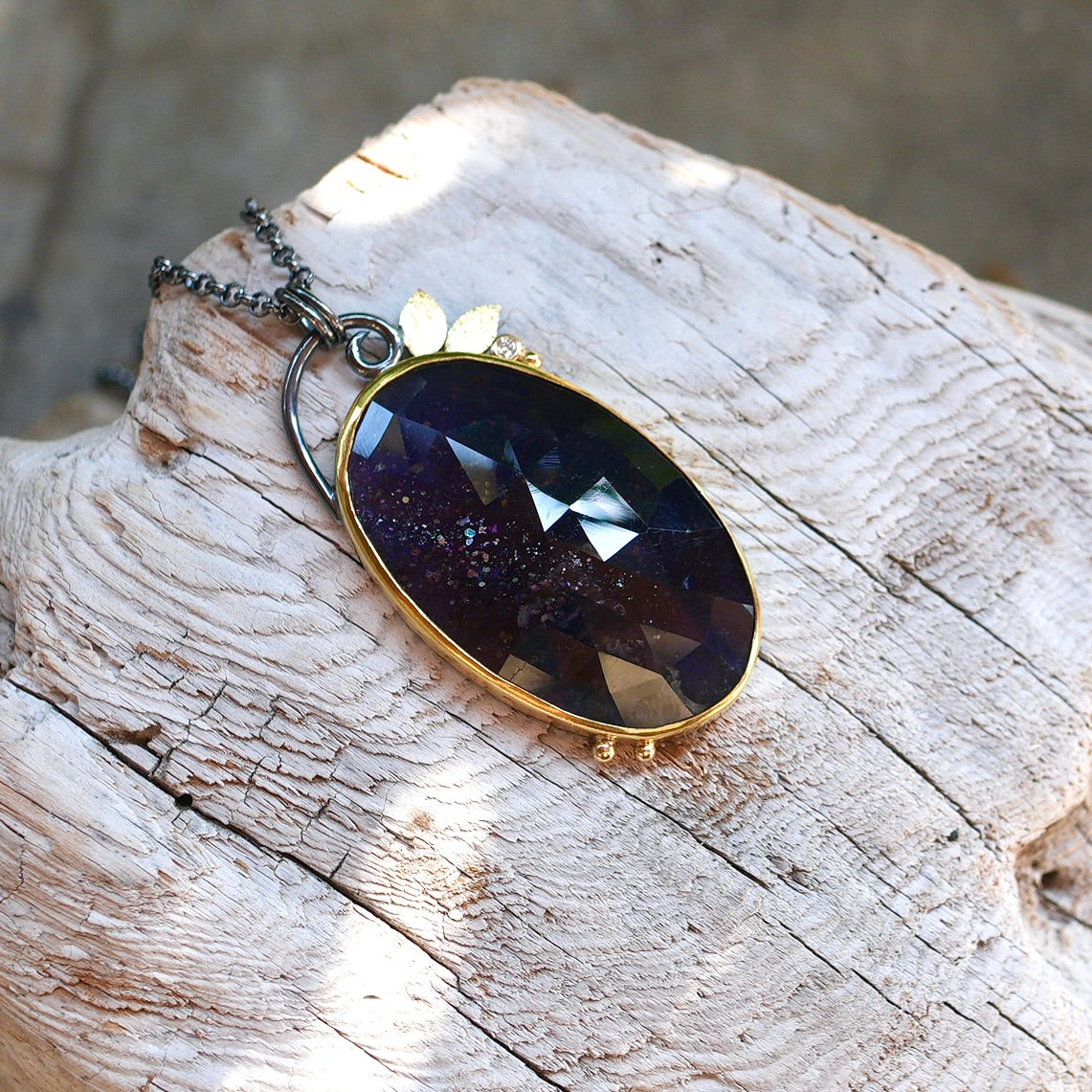 Sunstone Iolite and diamond pendant