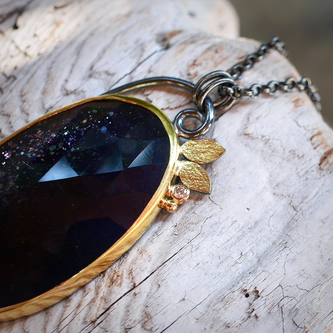 Sunstone Iolite and diamond pendant