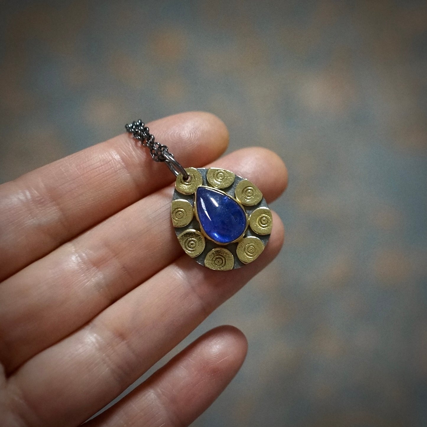 Glowing tanzanite pendant