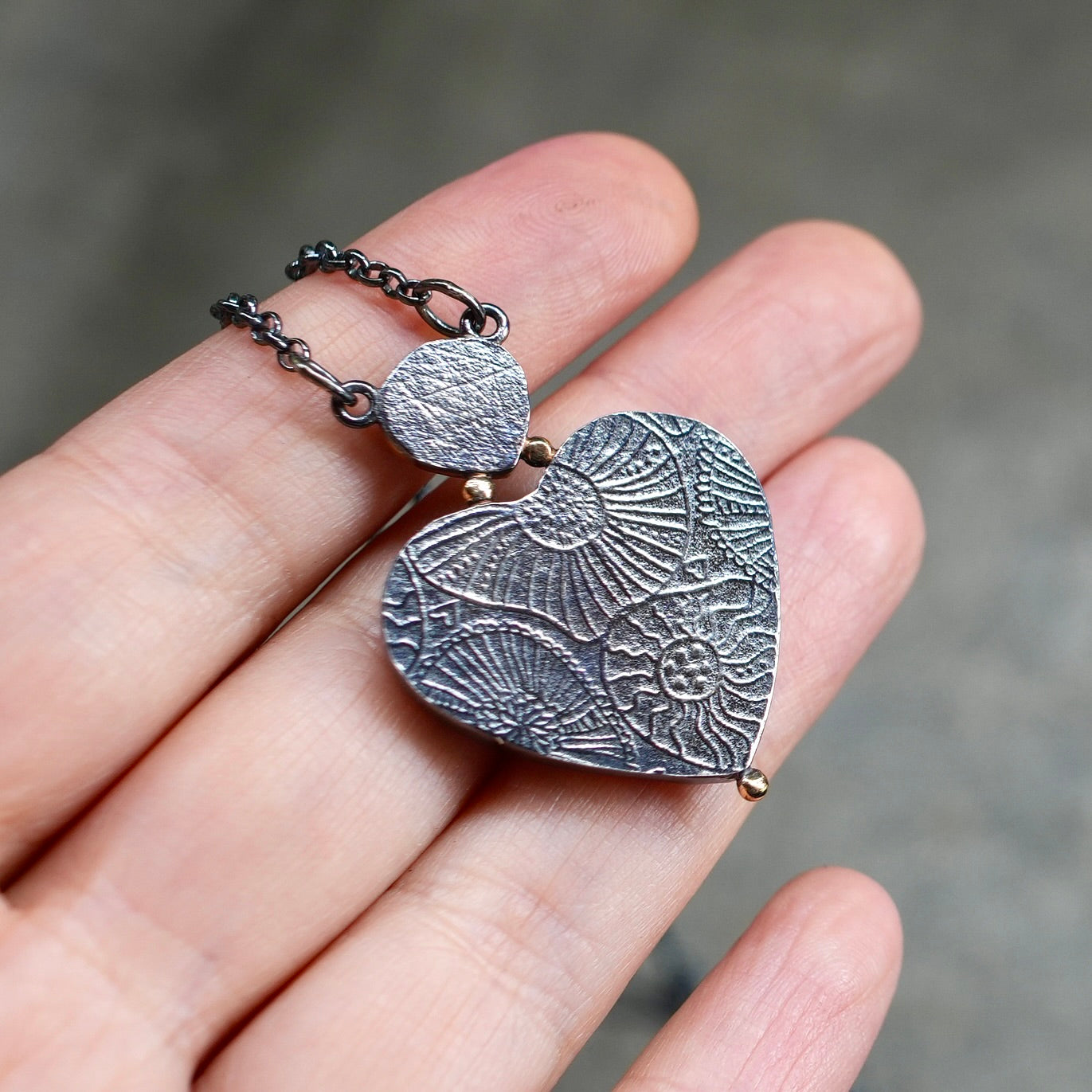 Phosphosiderite heart and iolite pendant