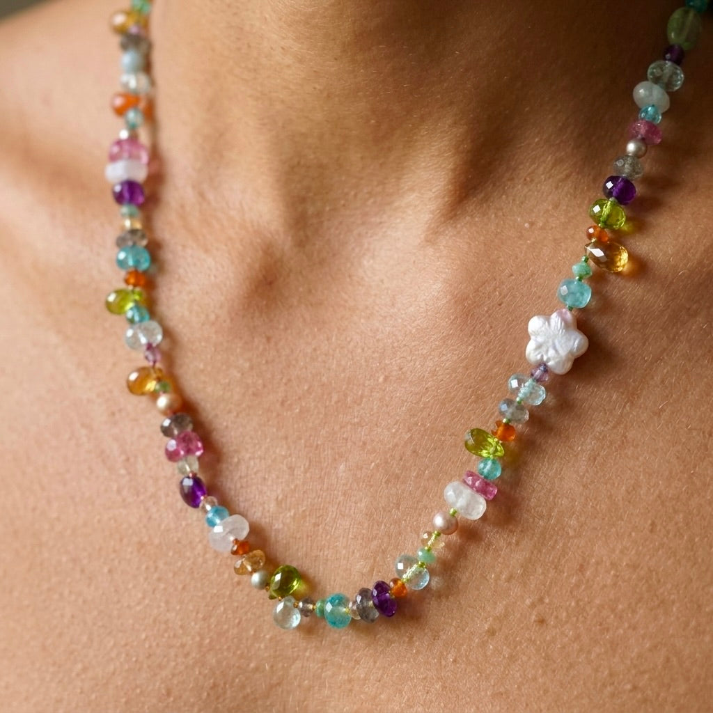 Vibrant gemstone mix silk-knotted necklace with a pearl flower