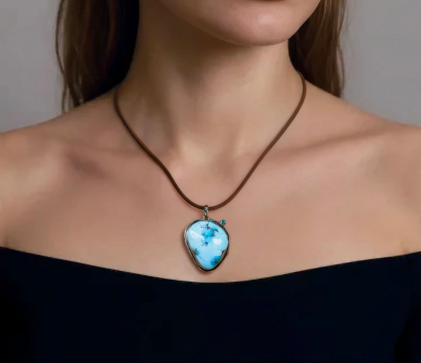 Golden Hills turquoise and Montana sapphire pendant