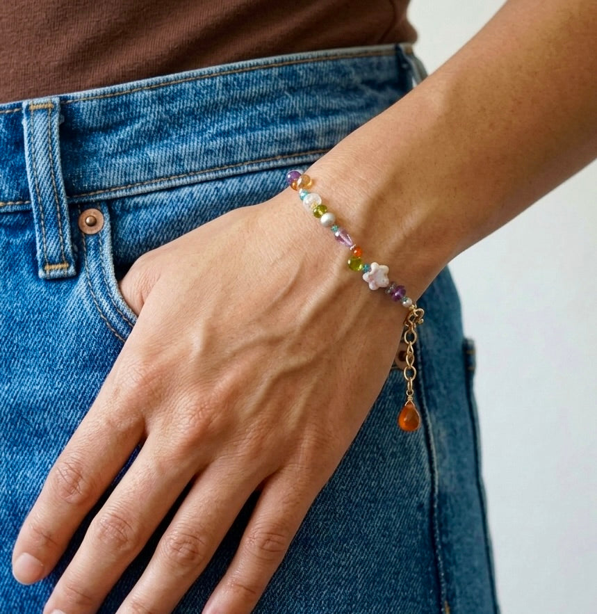 Vibrant gemstone mix silk-knotted bracelet with pearl flower